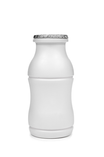 closeup of a bottle of drinkable yogurt on a white background