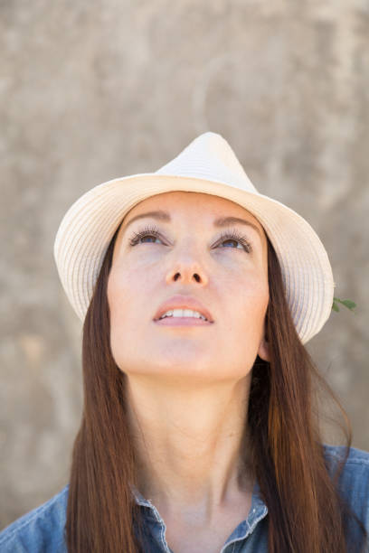istock Young woman looking up with confidence 840623218
