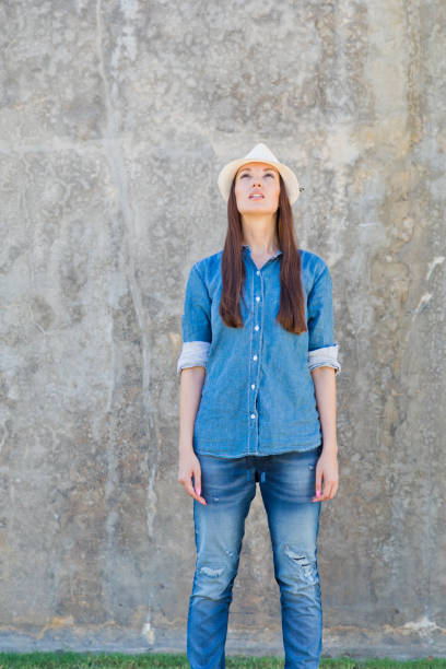 istock Young woman looking up with confidence 840623440