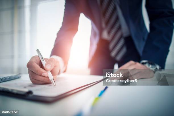 Business Man Signing Contract Making A Deal Stock Photo - Download Image Now - Checklist, Signing, Business