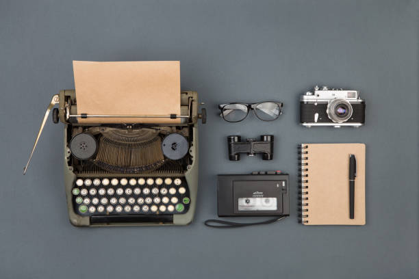 istock Journalist or private detective workplace - typewriter, camera, recorder and other stuff 840635550