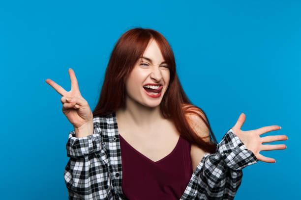 istock Pretty female taking selfie. Victory background 840635688