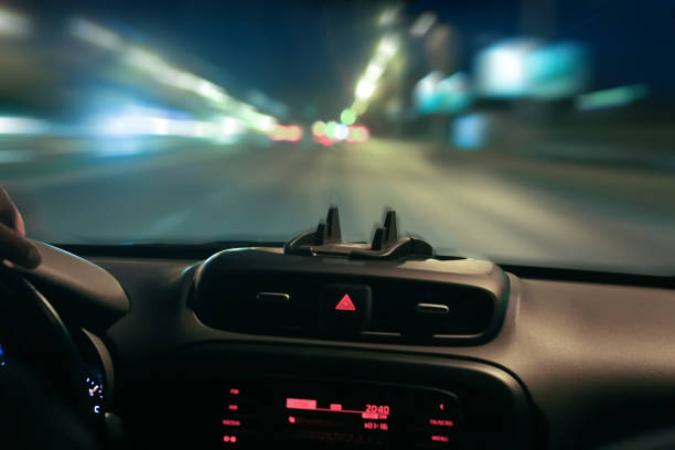 istock car moving on highway at night 840635828