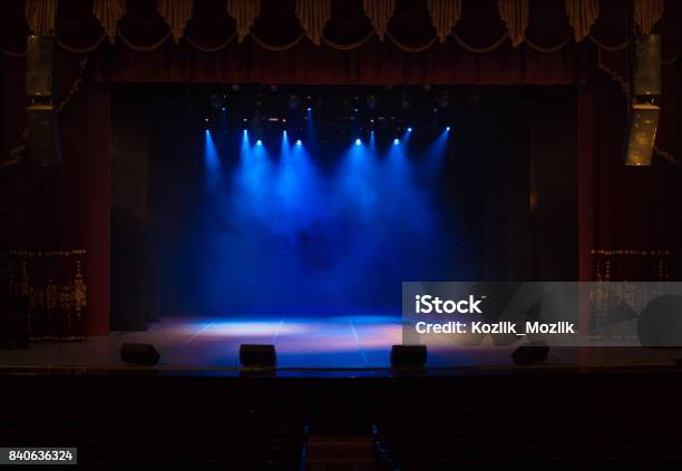 The Stage Of The Theater Illuminated By Spotlights And Smoke From The Auditorium Stock Photo - Download Image Now