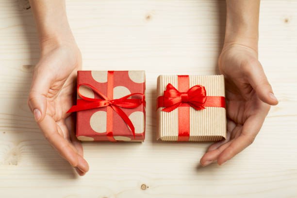 istock hands holding a gifts 840639144