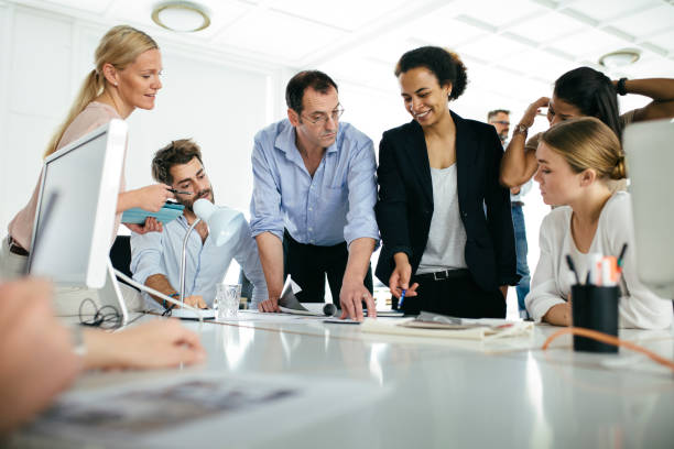 istock Team Brainstorming During Morning Business Meeting 840643510