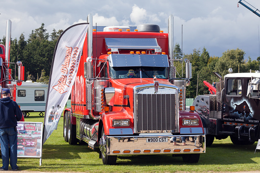 Norfolk: Truckfest Norwich is a transport festival in the UK based around the haulage industry located in Norfolk. Including Monster Truck car crushing. Clive Shaw Kenworth truck