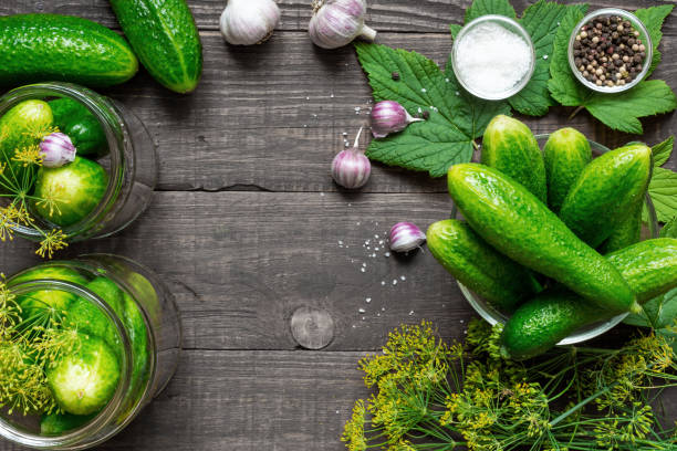 istock fresh harvested cucumbers with ingredients for cooking pickled cucumbers. preservation 840650994