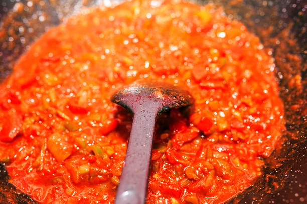 istock Fried tomato ready to ad to Paella 840651054