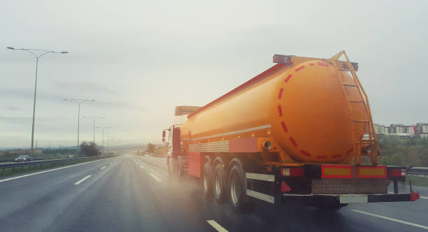 fuel tanker on the road - delivery van imagens e fotografias de stock