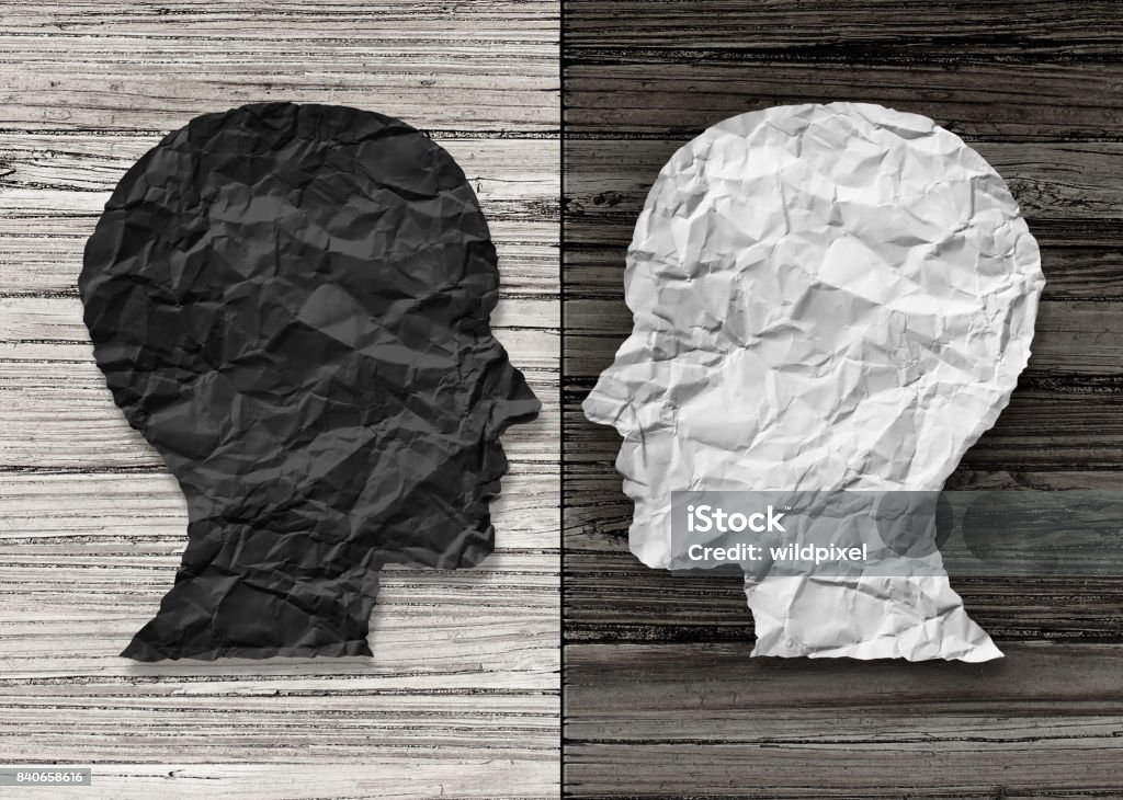 Bipolar Mental Health Bipolar mental health and brain disorder concept as a human head in paper divided in two colors as a neurological mood and emotion symbol or medical psychological metaphor for social behavior challenges in a 3D illustration style. Contrasts Stock Photo
