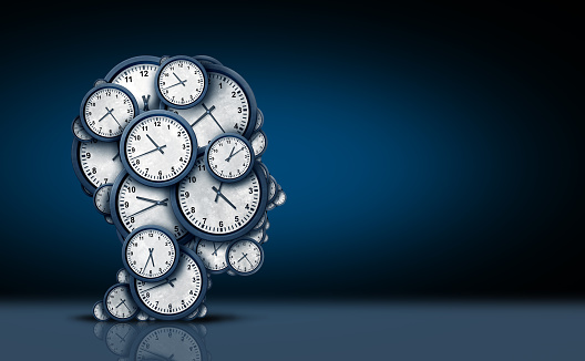 Time thinking concept as a group of clock objects shaped as a human head as a business punctuality and appointment stress metaphor or deadline pressure and overtime icon as a 3D illustration on a black background.