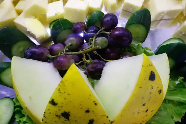 melons, grapes, cheese service