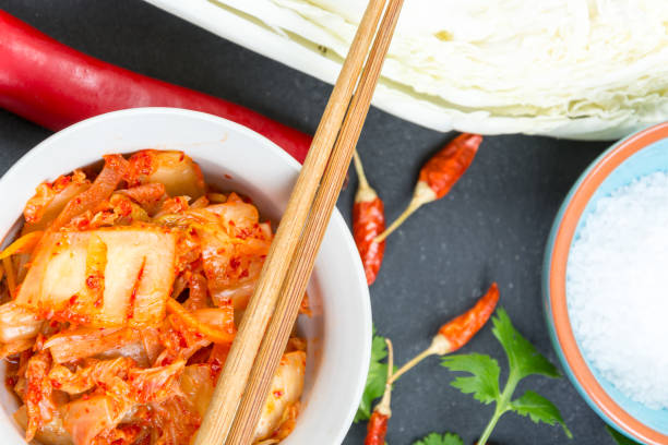 istock Kimchi. Fermented napa cabbage with ingredients 840672064