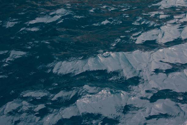 istock Blue sea water, background. sea wave close up. 840672178