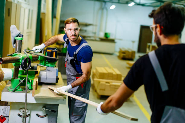 istock Young workers working in furniture factory 840675818