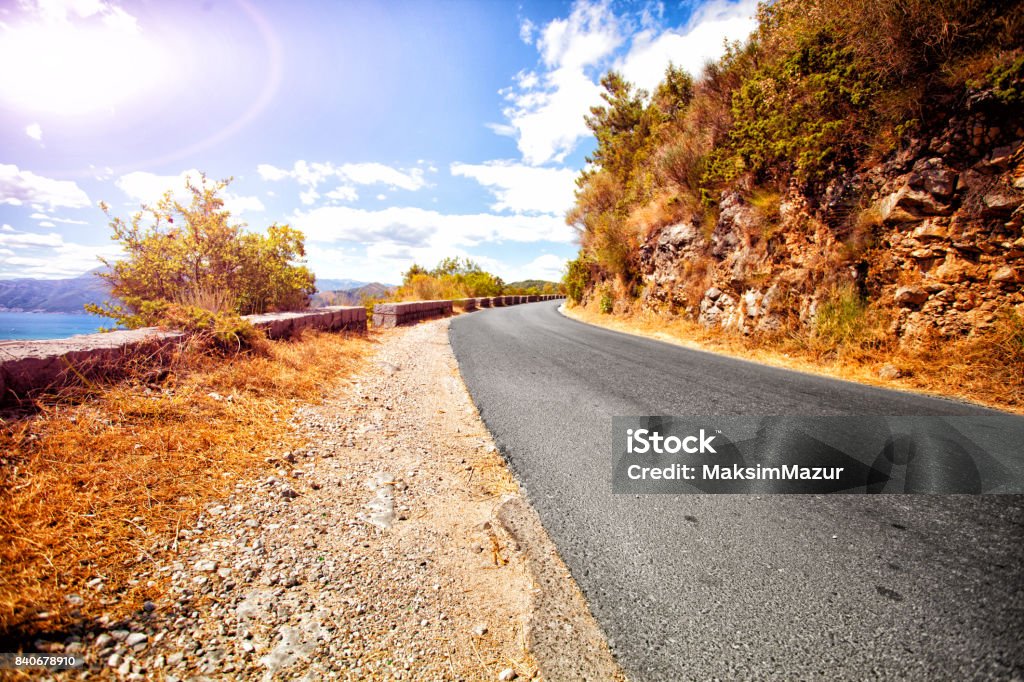 Paved road in the mountains far away. Montenegro Asphalt Stock Photo