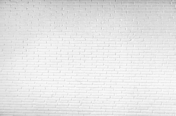 istock Old dirty clear white urban blank masonry brick wall pattern design background 840679310
