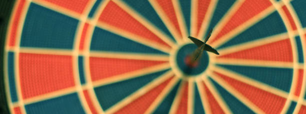 istock Darts arrows in the target center. Selective focus 840679552