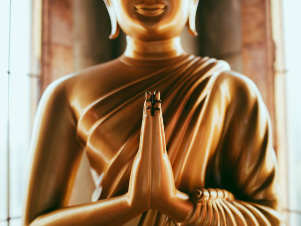 istock Close upof the hands of statue Buddha 840681966
