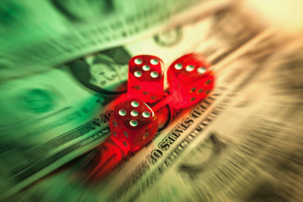 istock Dollar with dices illuminated with low light in radial blur 840685954