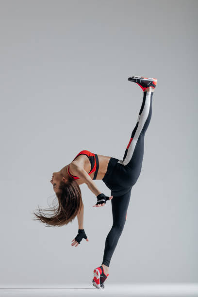 istock Young beautiful fitness female posing in studio 840685982