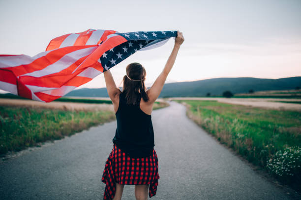 istock Girl with US flag 840686162
