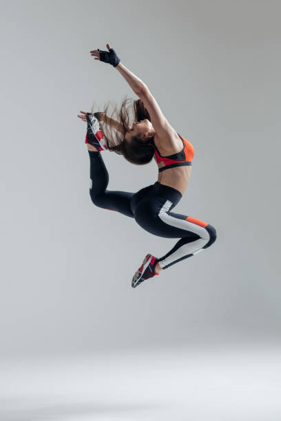 istock Young beautiful fitness female posing in studio 840686268