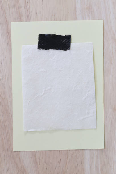 istock Yellow notepad paper of empty and copy space on wooden background. 840692220