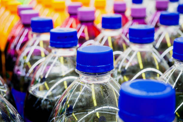 istock soft drinks bottles in supermarket 840692712