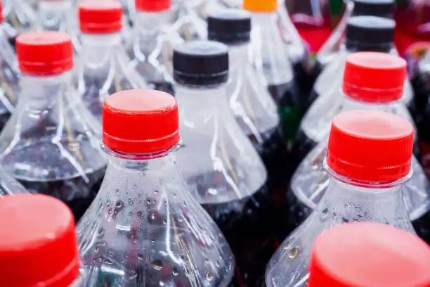 Photo of Carbonated soft drink bottles close up