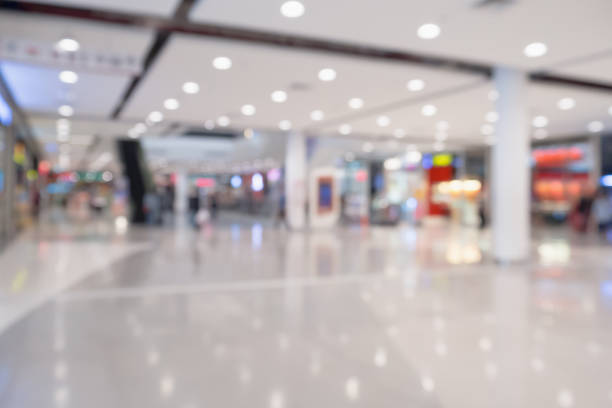 istock Abstract blur defocused shopping mall interior background 840692748