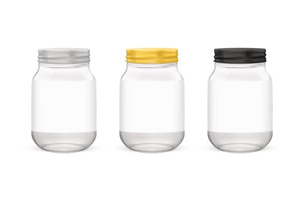 istock Vector realistic empty glass jar for canning and preserving set with silvery, golden and black lids closeup isolated on white background. Design templates for advertise, branding, mockup. EPS10 840696368