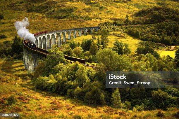 Steam Train On Viaduct Stock Photo - Download Image Now - Glenfinnan, Viaduct, Rail Transportation