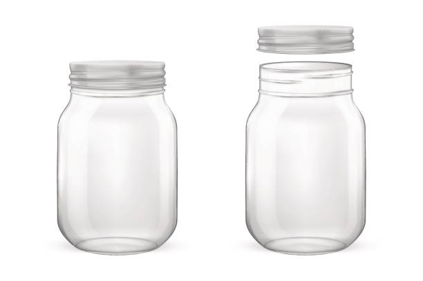 Vector realistic empty glass jar for canning and preserving set with silvery lid - open and closed - closeup isolated on white background. Design template for advertise, branding, mockup. EPS10 Vector realistic empty glass jar for canning and preserving set with silvery lid - open and closed - closeup isolated on white background. Design template for advertise, branding, mockup. EPS10 illustration. mason jar stock illustrations