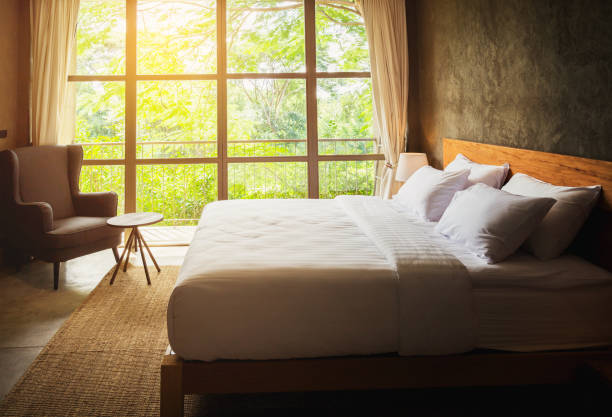 istock close up Bedroom Suite interior with white pillows and wall concrete background 840708574