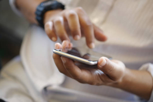 istock Close up of a man using mobile smartphone. 840712126