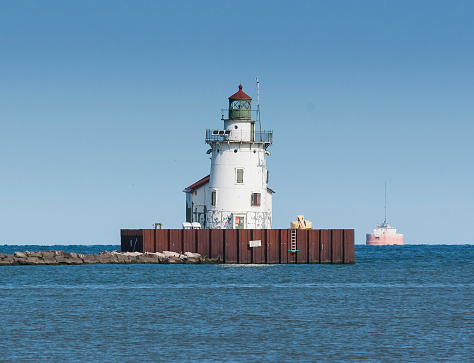 A lighthouse styled navigation beacon marking the western end of the entrance to the harbor at Cleveland, Ohio on Lake Erie