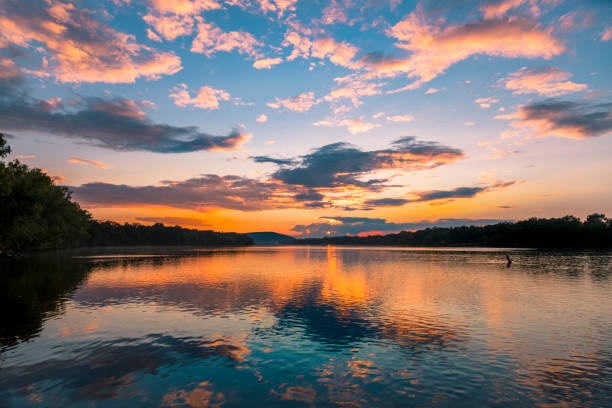 Wisconsin River Sunset Golden Hour over the Wisconsin River in Sauk City, WI wisconsin stock pictures, royalty-free photos & images