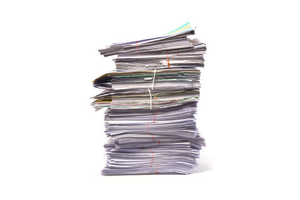 istock Stack of business papers isolated on white background 840720058