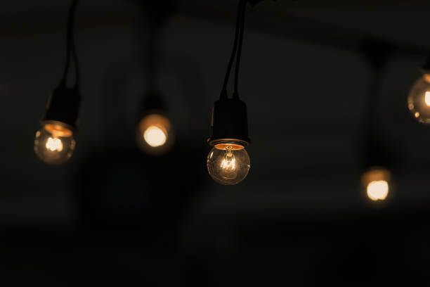 istock Retro light bulb hanging with dark space background for your decoration, concept of creativity 840725606
