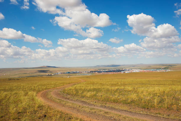 Inner Mongolia grassland Abaga stood on a hill overlooking the town panorama.