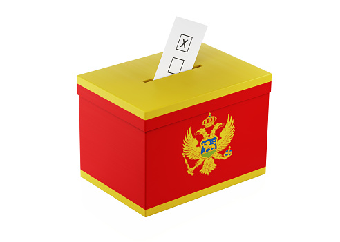 Ballot box textured with  Montenegrin Flag. Isolated on white background. A vote envelope is entering into the ballot box. Horizontal composition with copy space. Great use for referendum and 2018 presidential elections related concepts. Clipping path is included.