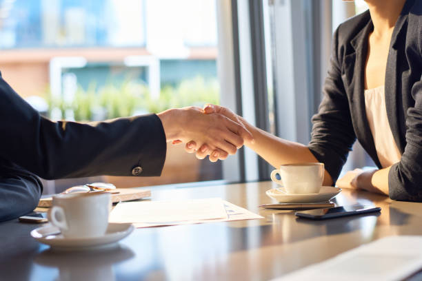 istock Firm Handshake of Business Partners 840733510