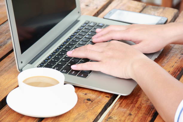 istock Female hand typing with laptop 840738392