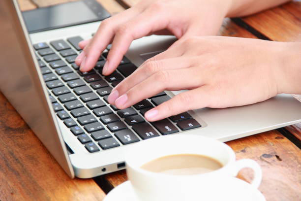 istock Female hand typing with laptop 840741114