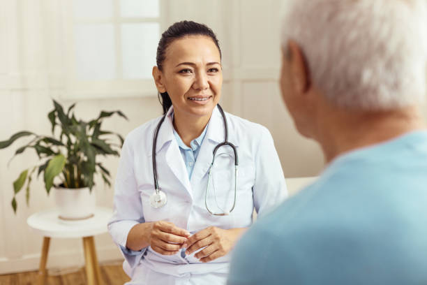 istock Cheerful skillful doctor doing her job 840753700