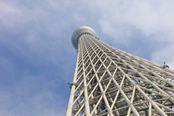 Tokyo sky tree with airplane trail