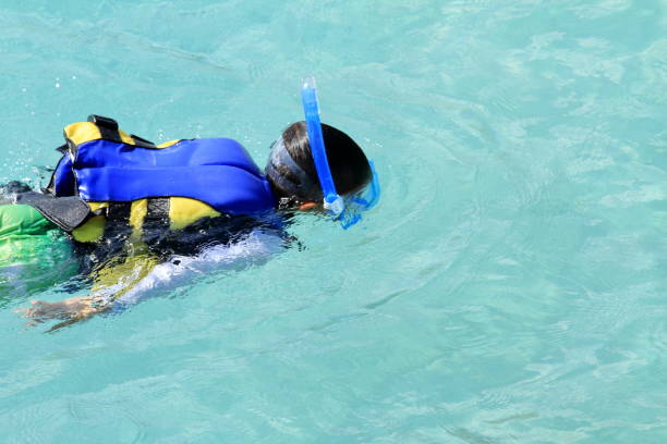 istock Japanese boy swimming with snorkel (second grade at elementary school) 840754590