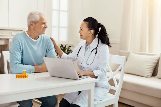 istock Pleasant female doctor supporting her patient 840755094